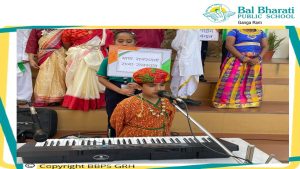 Colorful performance: Students showcasing the linguistic beauty of India.
